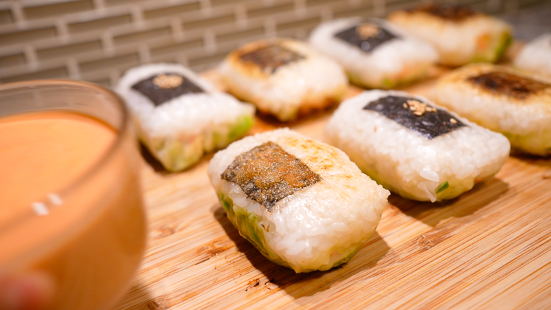 https://lookcatchu.com/wp-content/uploads/2023/01/crispy-rice-paper-sushi-rolls-closeup.jpg